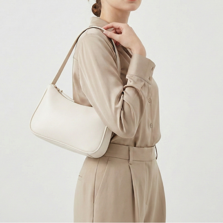Kompakte Crossbody Bag in sanftem Blau mit Schultergurt
