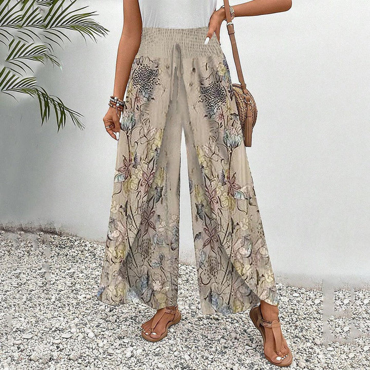 Bequeme Damen Freizeithose mit lebhaftem Blumenprint und elastischem Bund. Perfekt für den Sommer.