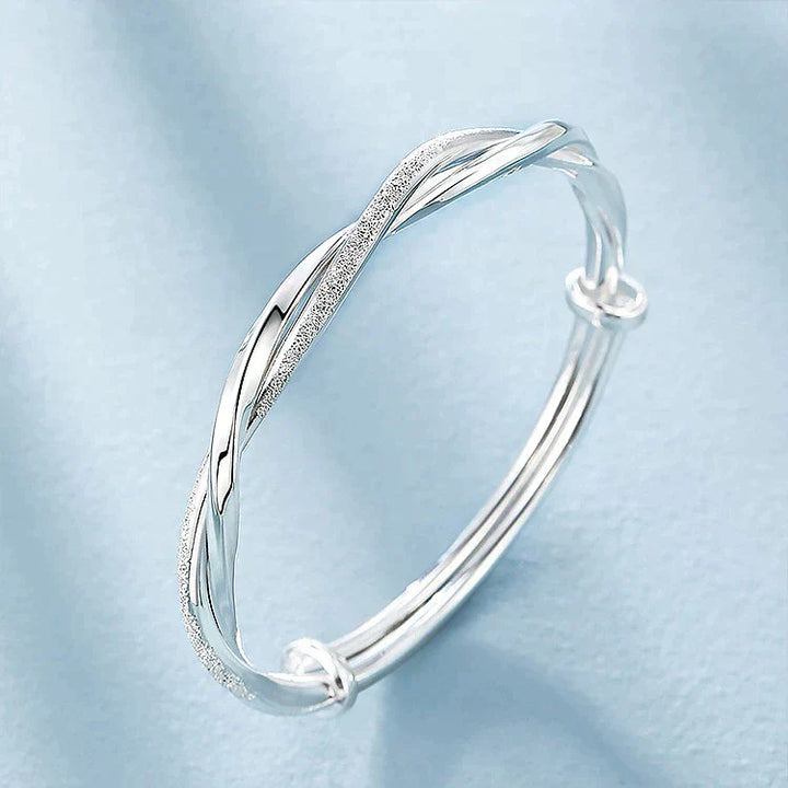 Silberarmband Damen, gedrehtes Design, elegant, Schmuck, Geschenk, modisch, Accessoire.