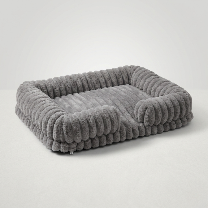 Bequemes orthopädisches Hundebett im Sofastil mit Memory-Schaum, ideal für gesunden Schlaf.