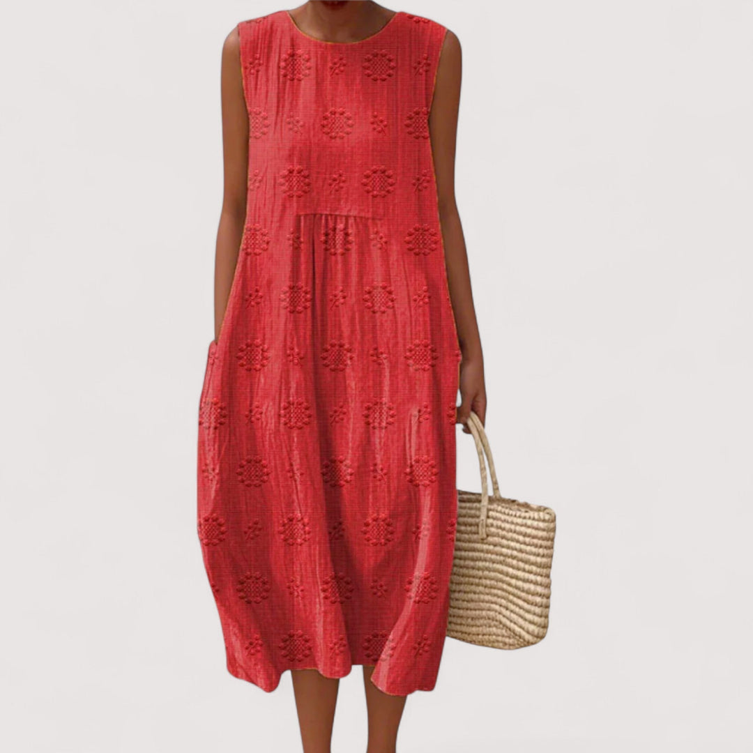 Atmungsaktives, bequemes Damen Sommerkleid mit hübschem Blumenmuster. Ärmellos und leicht für warme Tage.