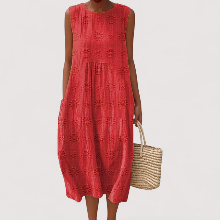 Atmungsaktives, bequemes Damen Sommerkleid mit hübschem Blumenmuster. Ärmellos und leicht für warme Tage.