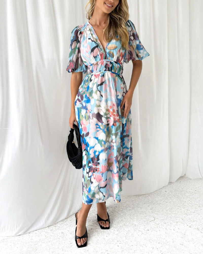 Damenmode Maxikleid im floralen Look, freigestellt