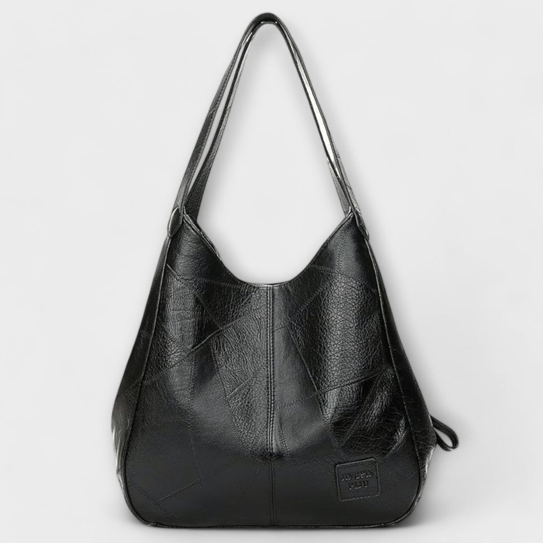Alltagstaugliche Handtasche im klassischen Stil offen