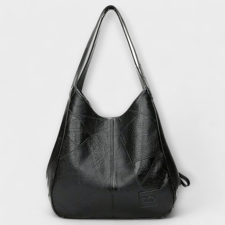 Alltagstaugliche Handtasche im klassischen Stil offen