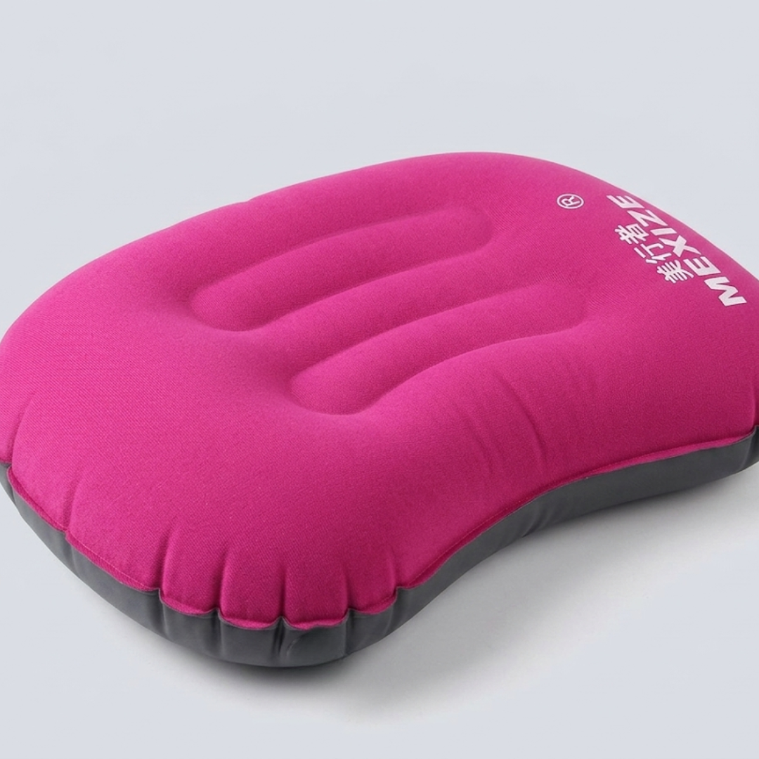 Rosa aufblasbares Reisekissen mit ergonomischer Form im Detail