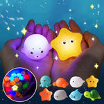 4 Badespielzeuge + Fangnetz