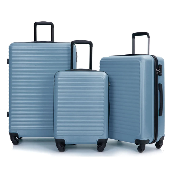 3-teiliges blaues Reisekofferset mit Hartschale und Rollen, ideal für Urlaub und Geschäftsreisen.