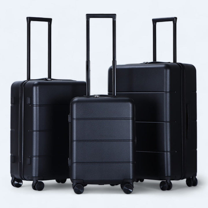 3-teiliges robustes Hartschalen-Kofferset in Schwarz, Grau, Gelb für flexible Reisen.