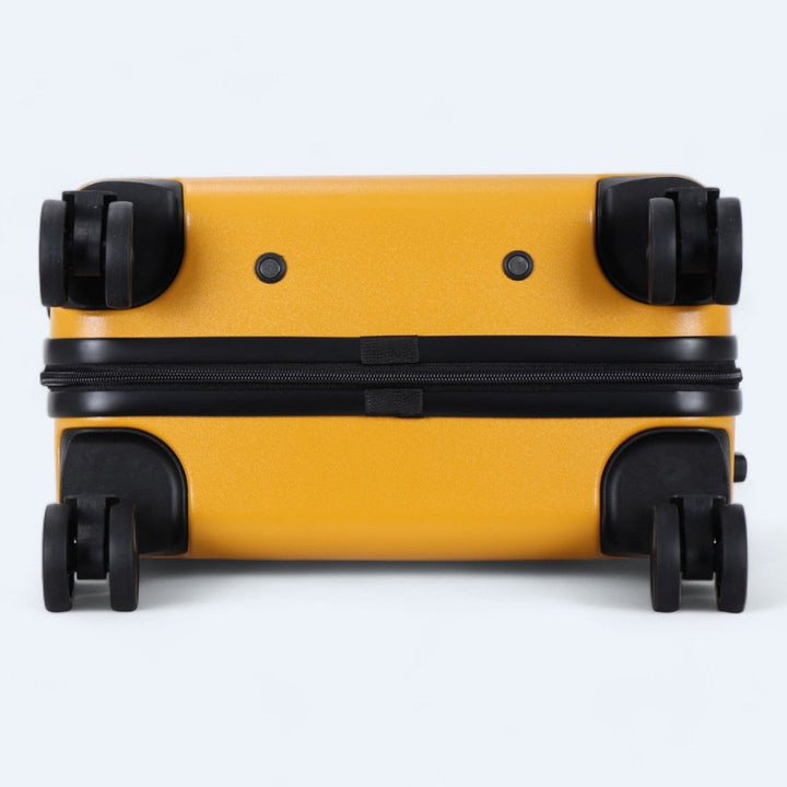 Robustes Rollkoffer-Set mit Hartschale, in Schwarz, Grau und Gelb, ideal für Flugreisen.