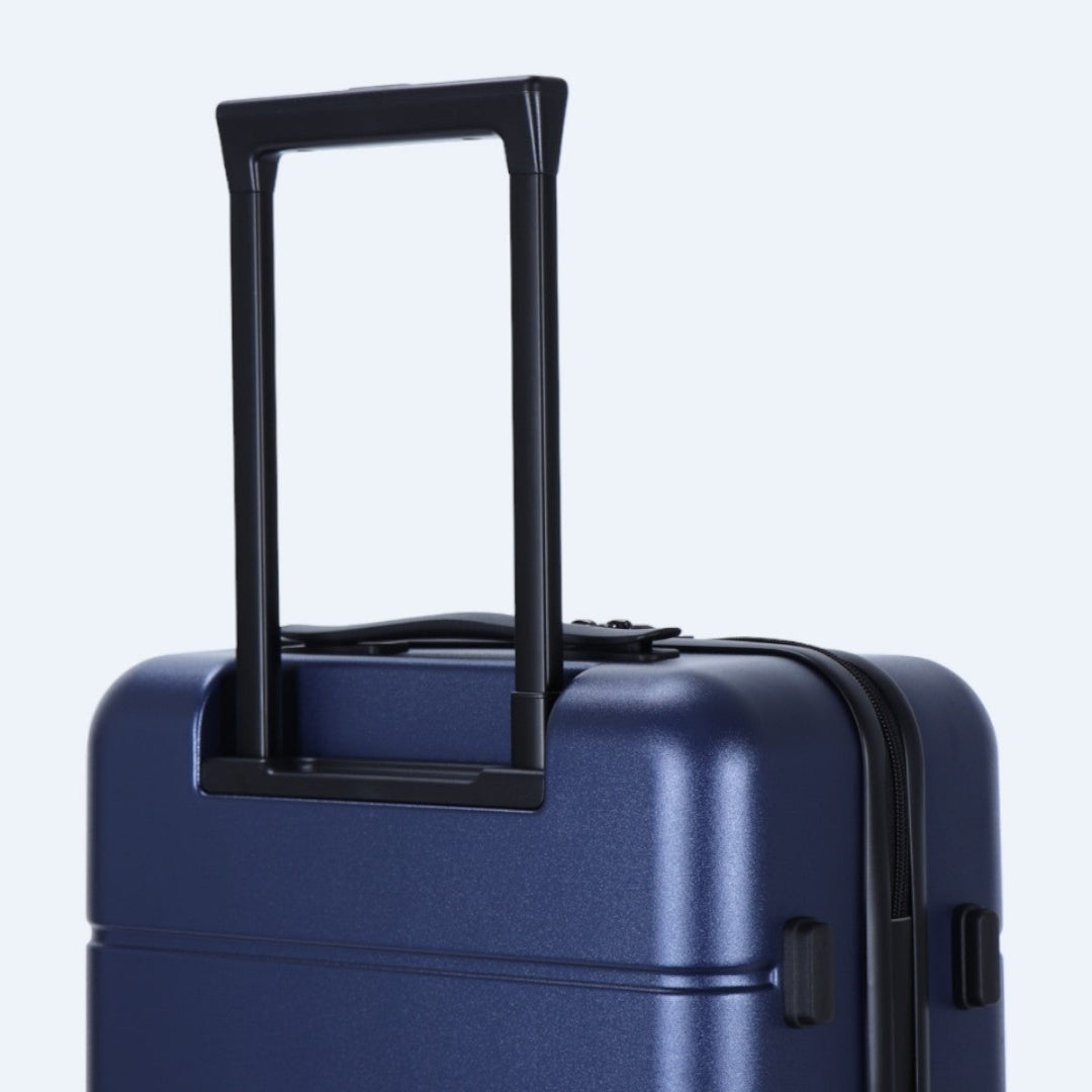 Moderne Hartschalen-Trolleys in Schwarz, Grau und Gelb für stilvolle Reisende.