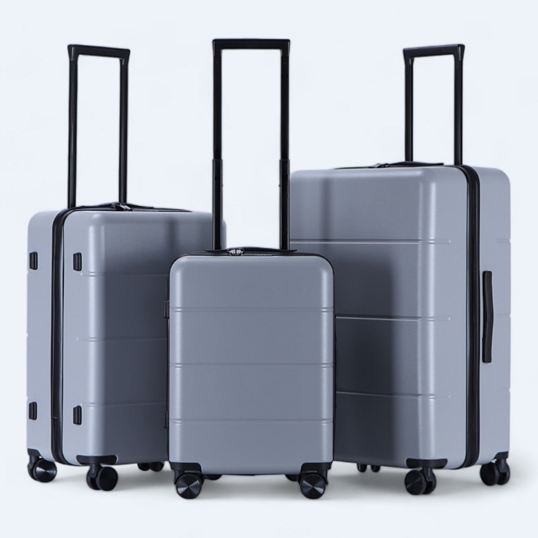 Hartschalen-Koffer-Set in dynamischen Farben: Schwarz, Grau, Gelb als Blickfang.