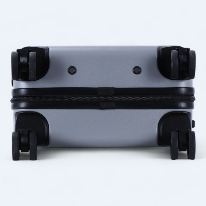 Schwarzer Hartschalen-Trolley, Detail des ergonomischen Tragegriffs.