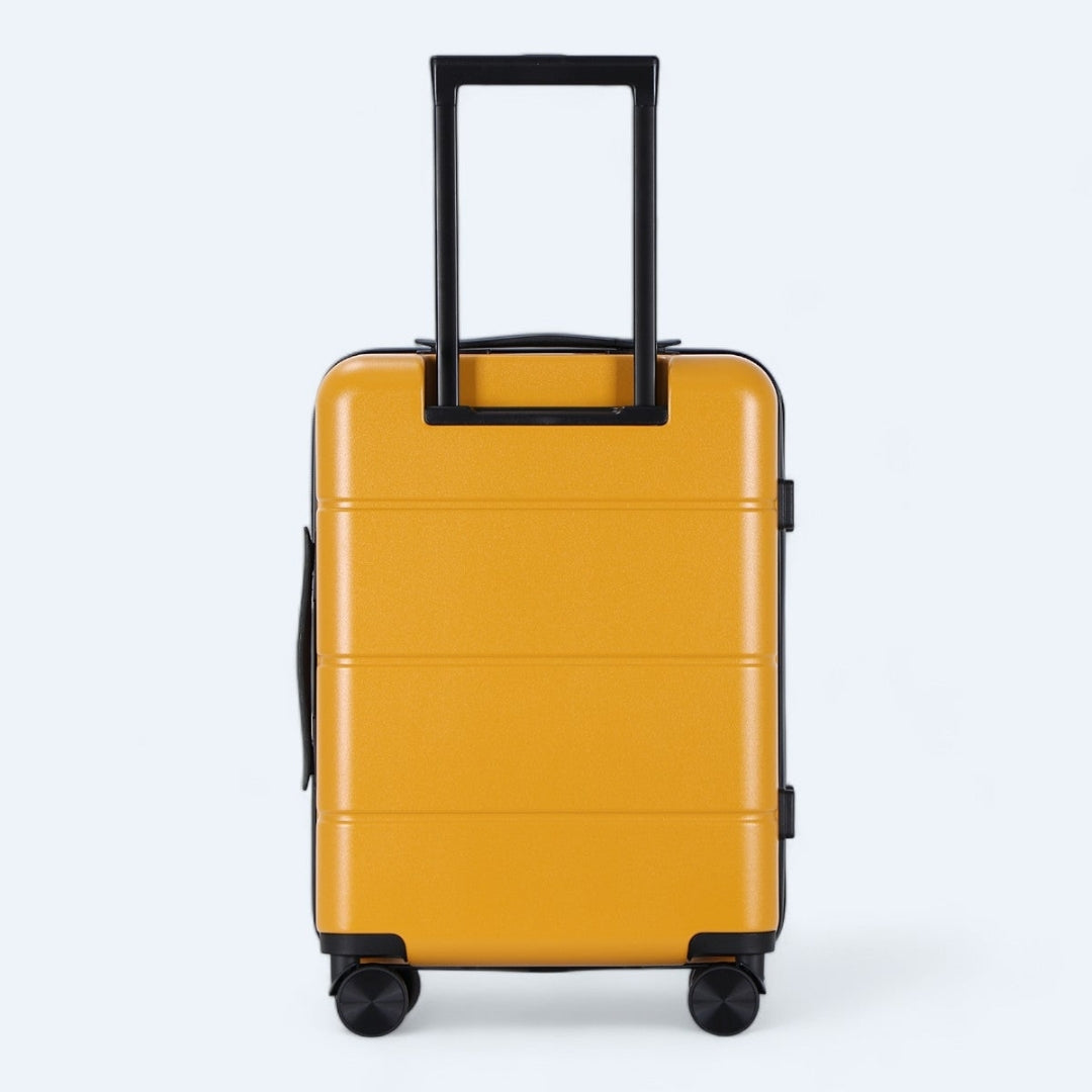 Grauer Hartschalen-Trolley, Teil des 3-teiligen robusten Kofferset für flexibles Reisen.