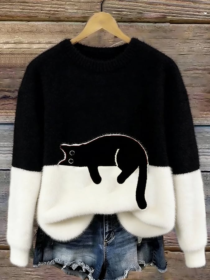 Oversized Damenpullover mit Katzenmotiv, Ärmel und Bündchen im Detail