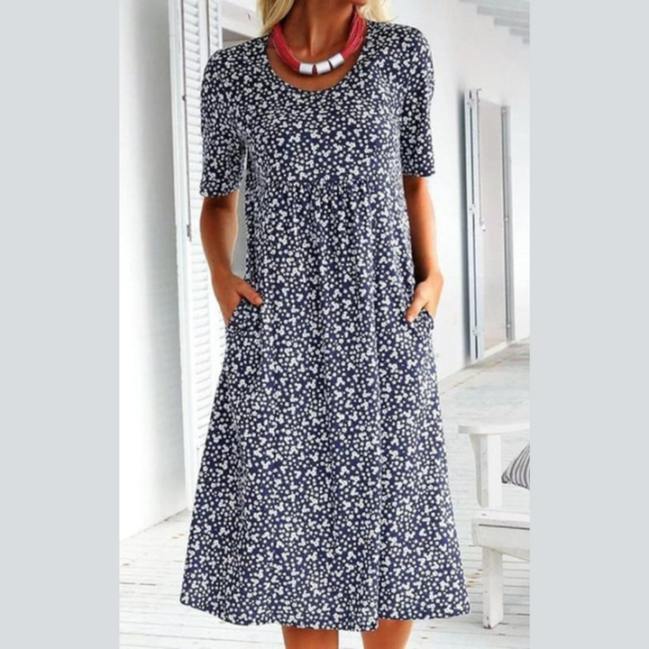 Damen Midikleid in Schwarz mit feinem Blumenmuster und praktischen Seitentaschen