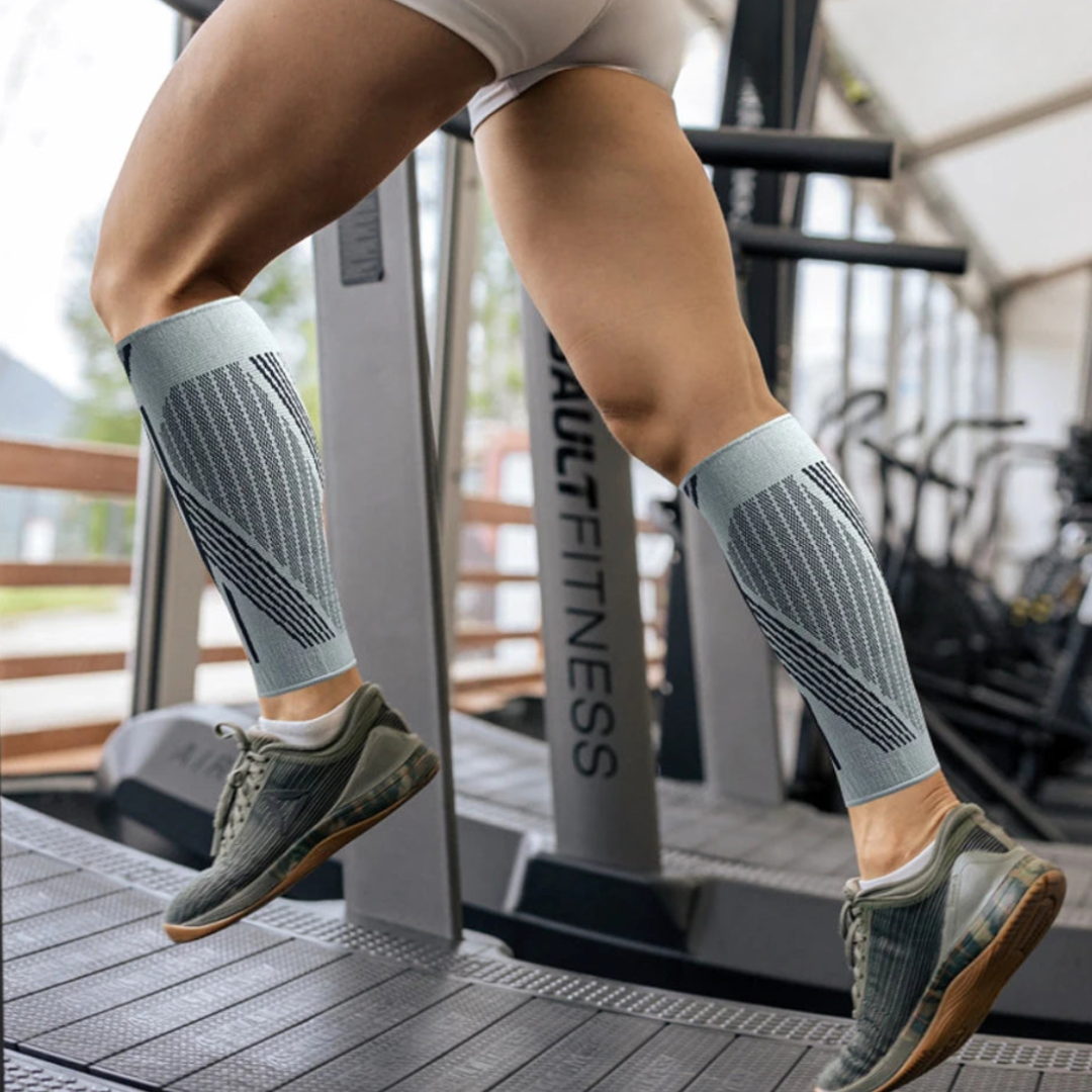 Paar Kompressions-Wadenbandagen in Schwarz und Grau für Fitness und Ausdauersport