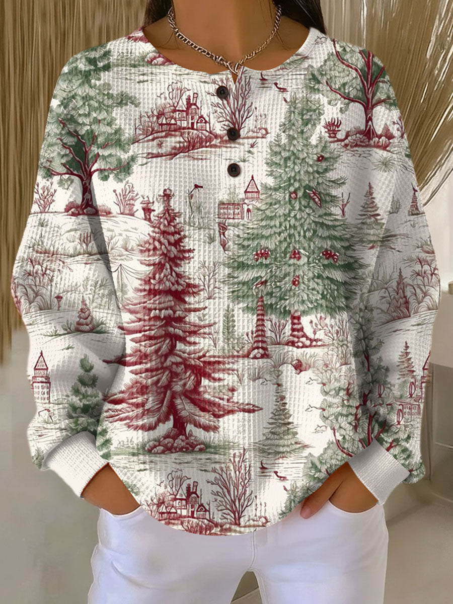 Nahaufnahme des gemusterten Damen Pullovers mit Waffelstrick und Knöpfen