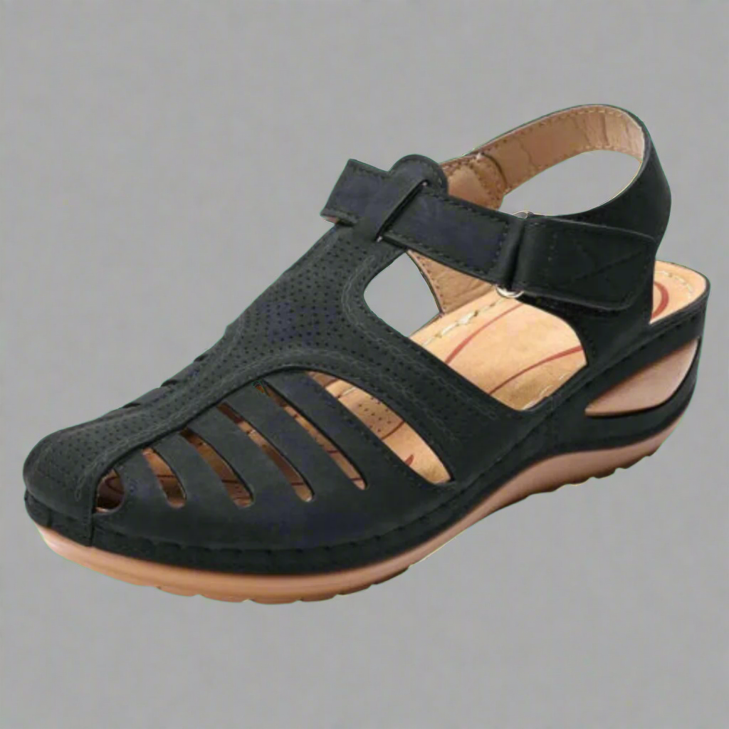 Elegante orthopädische Sandale in Schwarz, vielseitig kombinierbar für jeden Anlass.