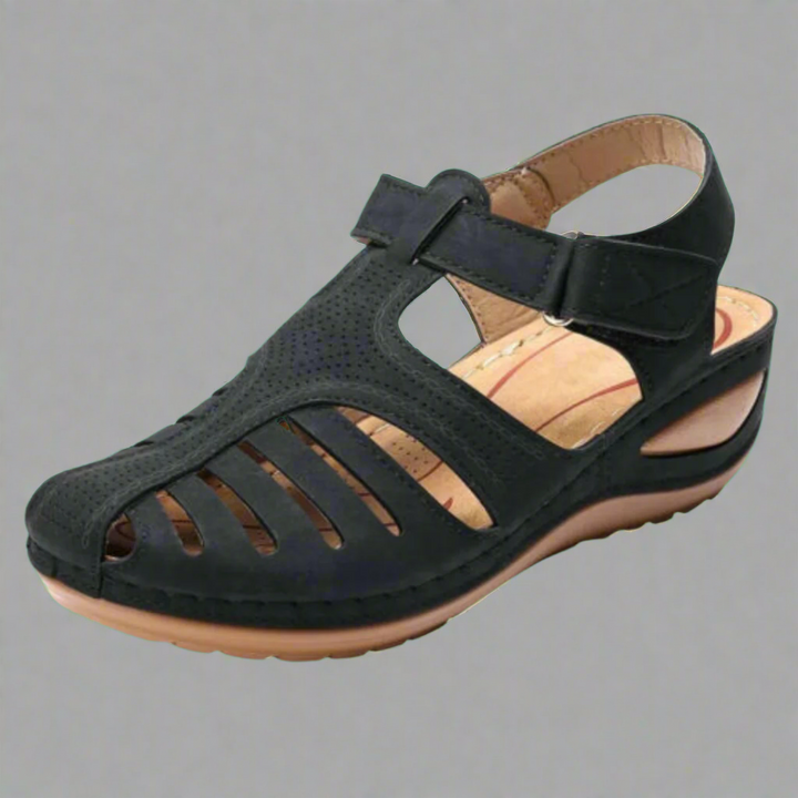 Elegante orthopädische Sandale in Schwarz, vielseitig kombinierbar für jeden Anlass.