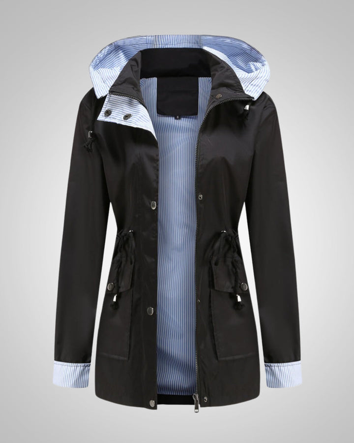 Wasserdichte Damen Regenjacke in schickem Design, mit Kapuze & Kordelzug für jede Gelegenheit.