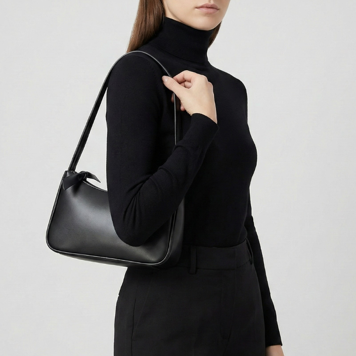 Schwarze Schultertasche für Damen elegant kombiniert