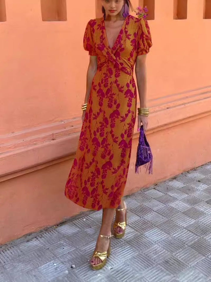Wickelkleid lang mit floralem Muster in der Rückenansicht