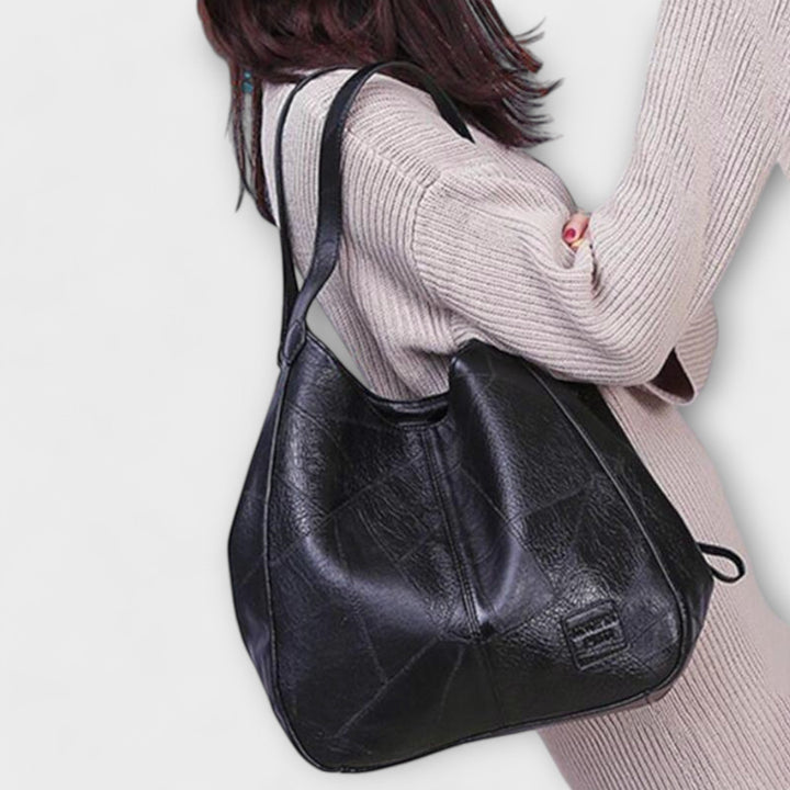 Elegante Retro Tasche mit Details und Beschlägen