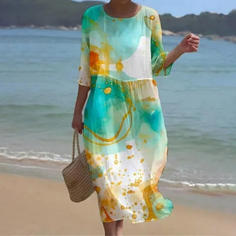 Damen Sommerkleid mit abstraktem blau-grünem Muster am Wasser