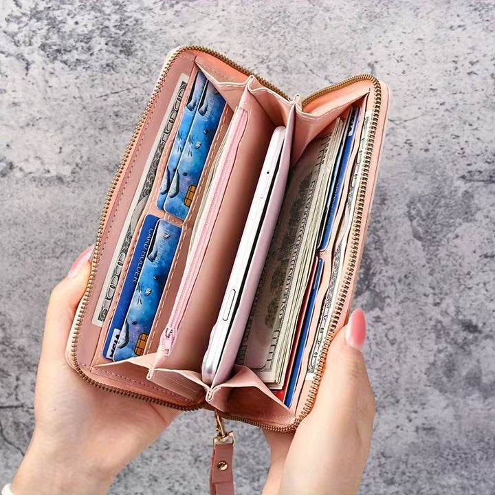 Funktionales Damen Portemonnaie Elena in Schwarz. Praktische Damengeldbörse mit viel Platz für Karten.