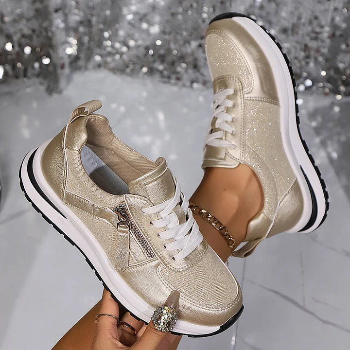 Goldene Damen Sneaker im glänzenden Look mit Details