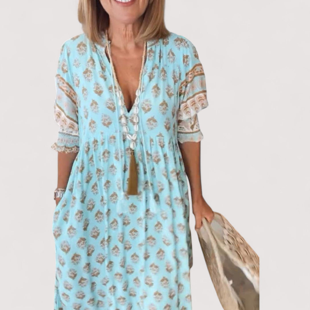 Langes Maxikleid für Damen im sommerlichen Design mit tiefem V-Ausschnitt