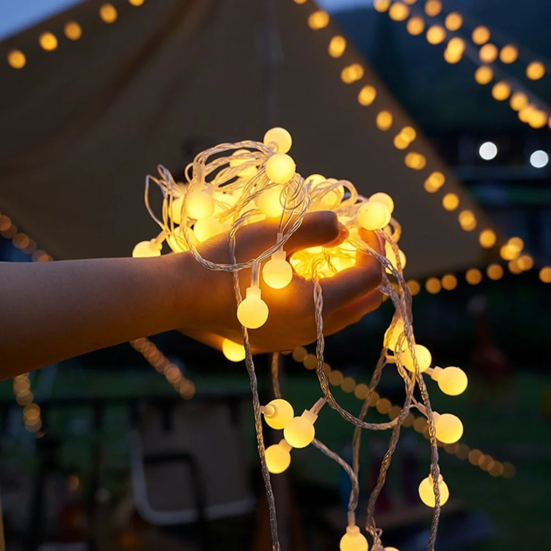 Verpackung und aufgerollte Solare Lichterkette Outdoor bereit zur Montage