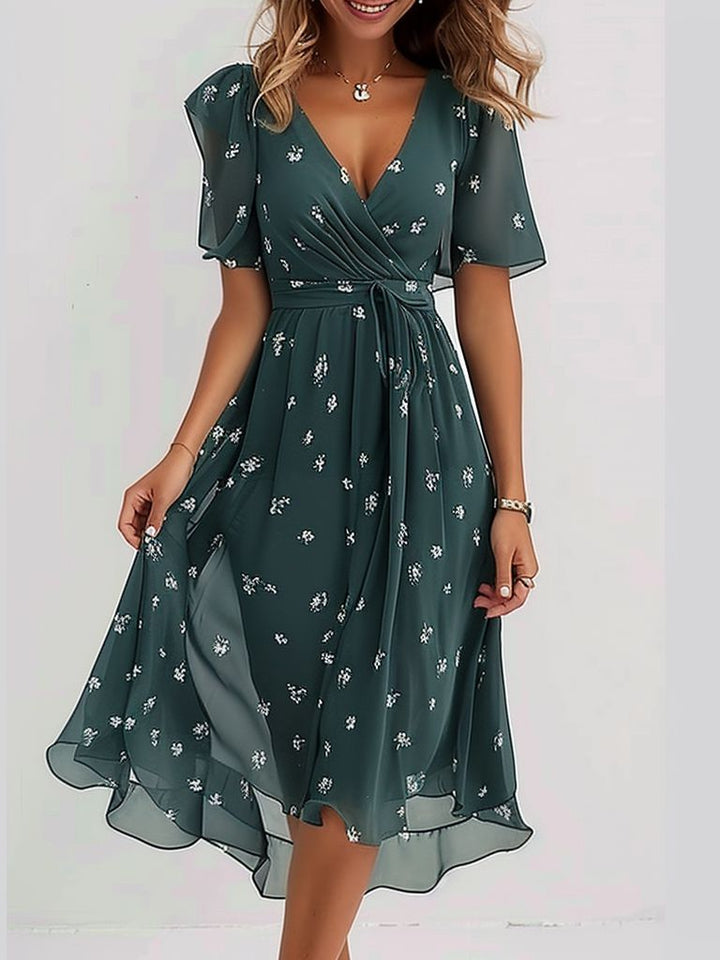 Grünes Damen Midikleid mit V-Ausschnitt und A-Linie als sommerliches Freizeitkleid