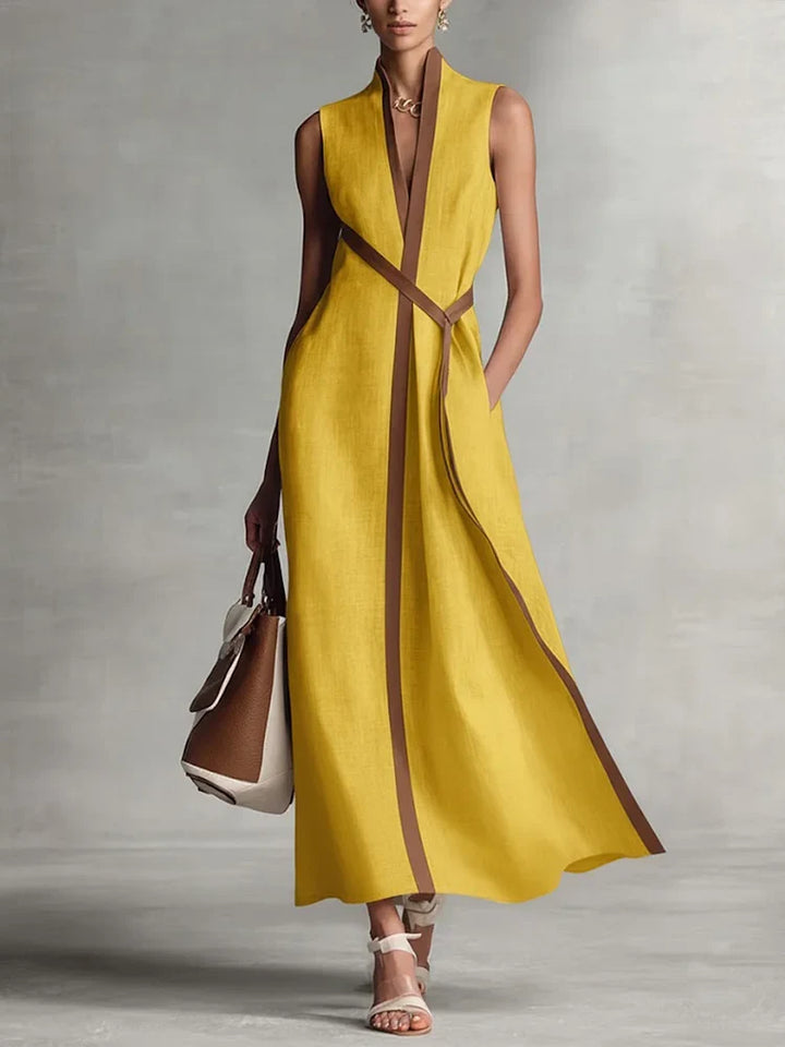 Ärmelloses Damen Maxikleid, vielseitig als Strand- oder Reisekleid, mit elegantem Stehkragen und Bindegürtel.