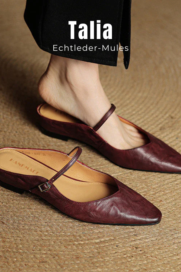 Rückansicht der eleganten Damen Pantoletten. Spitze Mary Jane Schuhe mit Riemen für sicheren Halt.