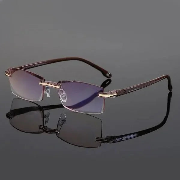 Brille ohne Rand, rechteckig, Metallrahmen, blaue Gläser, stilvoll, modern, Unisex-Design.