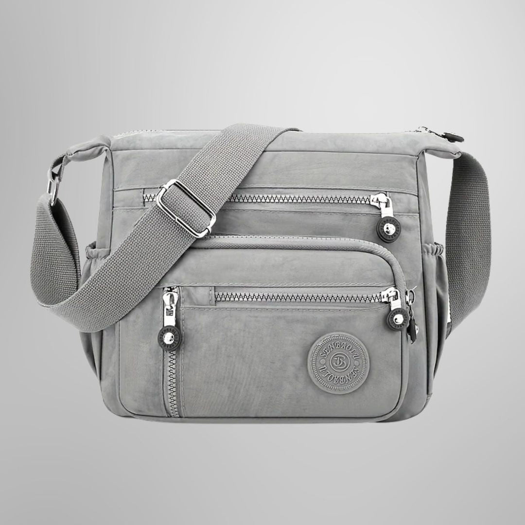Elegante Damen Umhängetasche mit mehreren Fächern, ideal als Crossbody-Alltagstasche & Reisetasche.