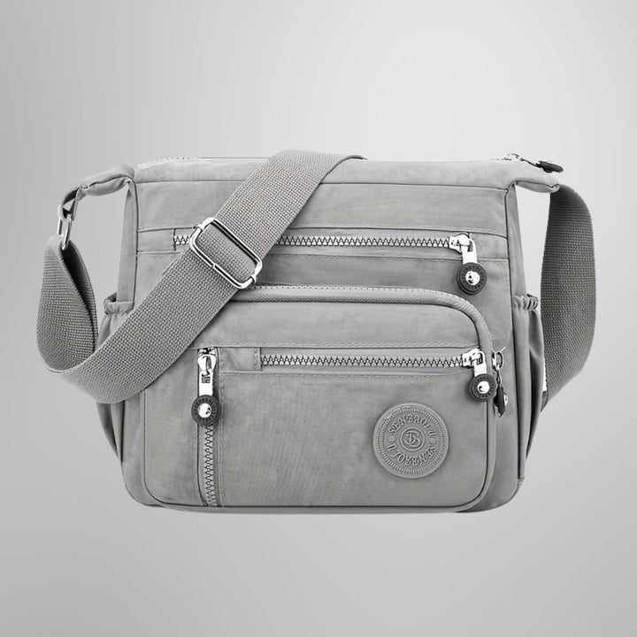 Elegante Damen Umhängetasche mit mehreren Fächern, ideal als Crossbody-Alltagstasche & Reisetasche.