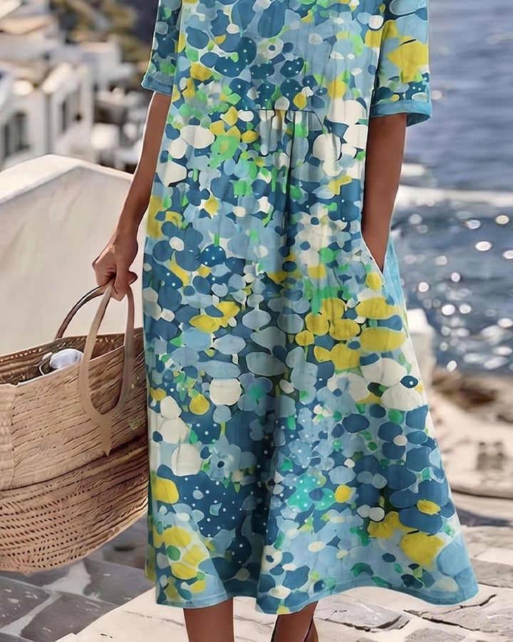 Damen Sommerkleid in Midi-Länge mit frischem Blumenmuster und V-Ausschnitt