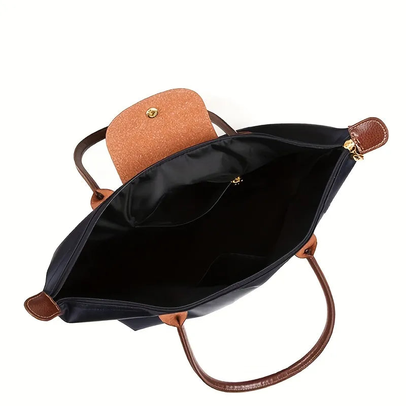 Celeste Handtasche in Khaki mit braunen Ledergriffen, elegantes Design.