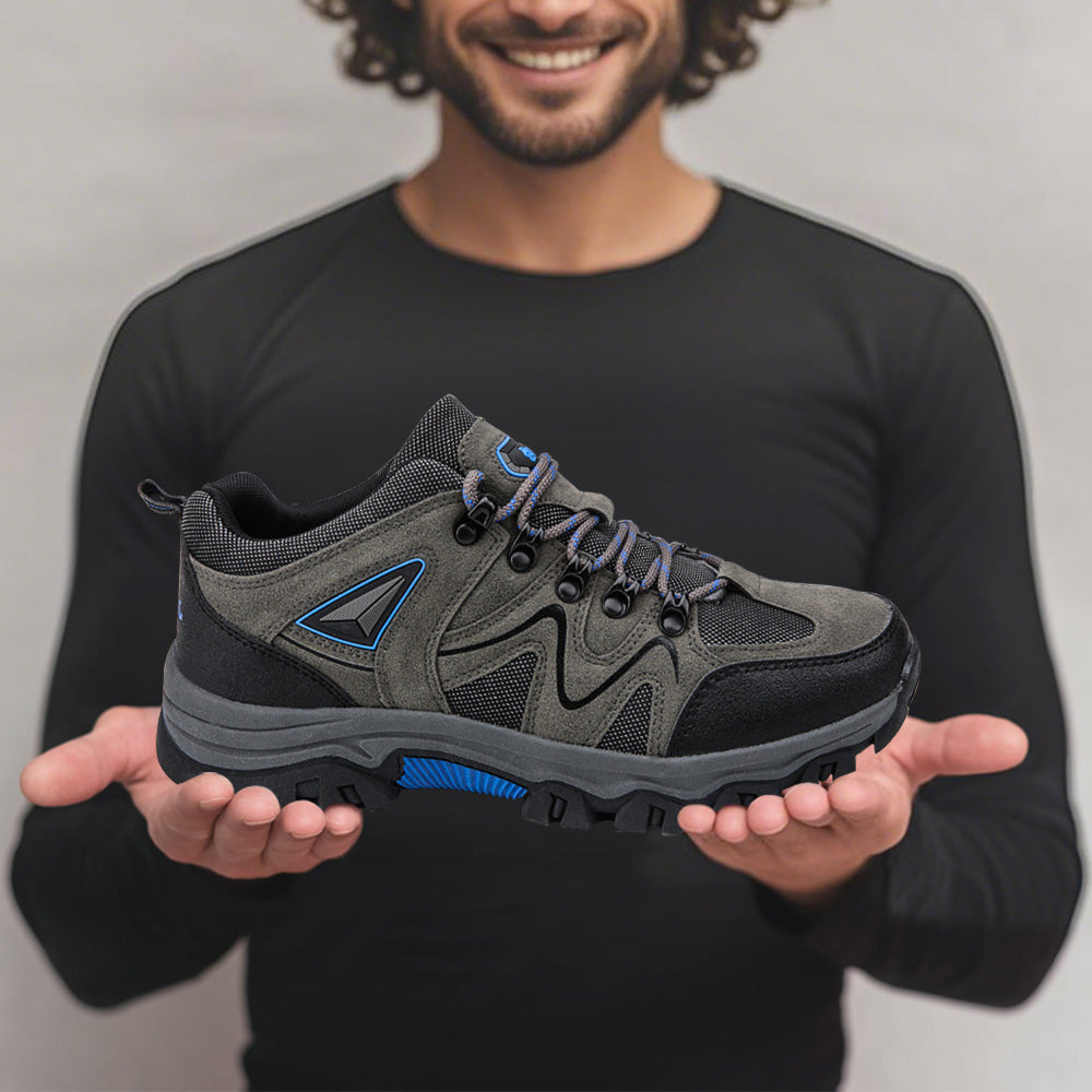 Herren Freizeitschuhe für Outdoor-Aktivitäten, rutschfest und atmungsaktiv, vor malerischer Kulisse.