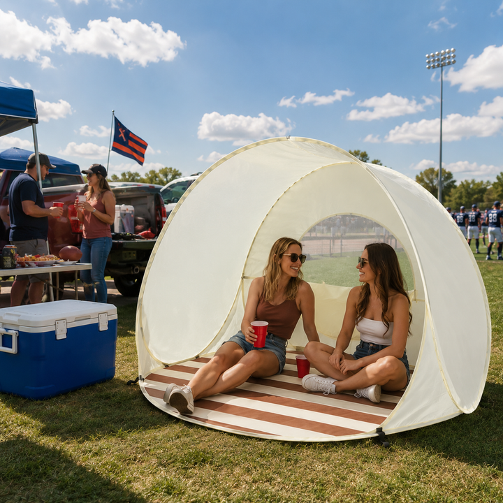Pop-Up Strandmuschel für 3-4 Personen, UV-Schutz 50+, ideal für entspannte Tage.