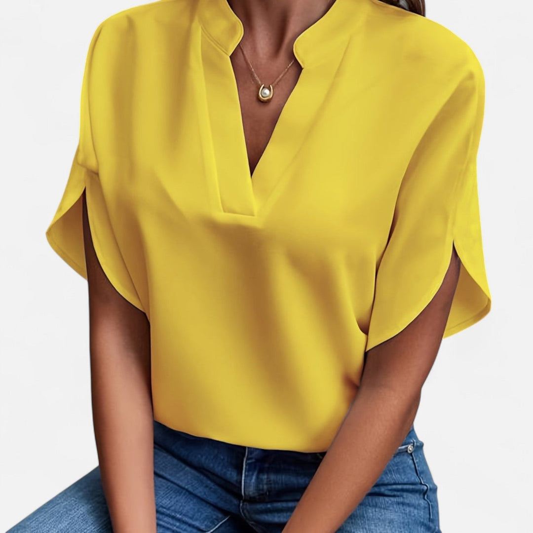 Stilvolle Damen Bluse Clara mit eleganten weiten Ärmeln, ideal für Business und Freizeit. Bequem und vielseitig.