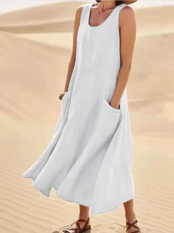 Farbenfrohes Damen Sommerkleid, Midilänge. Elegant, bequem und locker geschnitten für Strand & Urlaub.