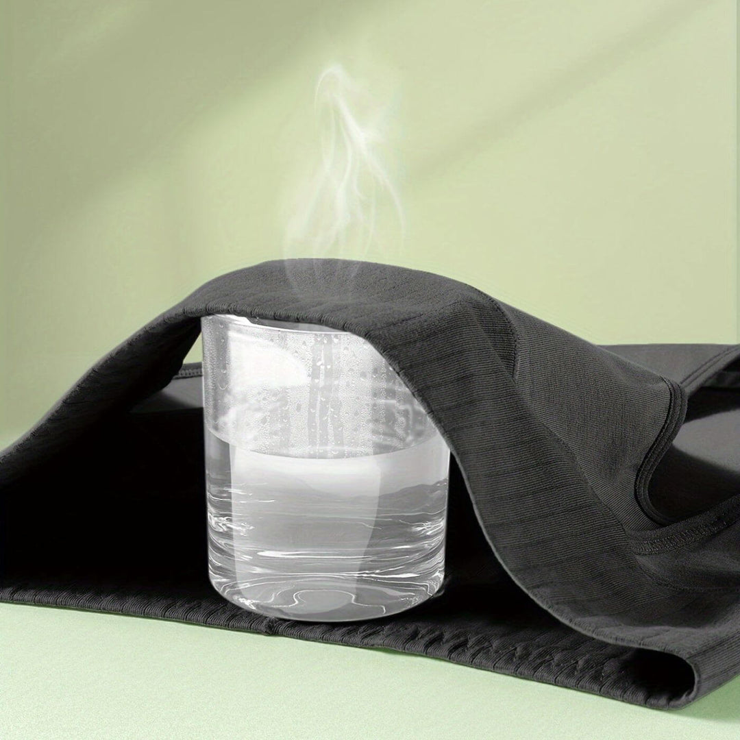 Rückansicht des formenden Damen High Waist Slips in Schwarz an Model