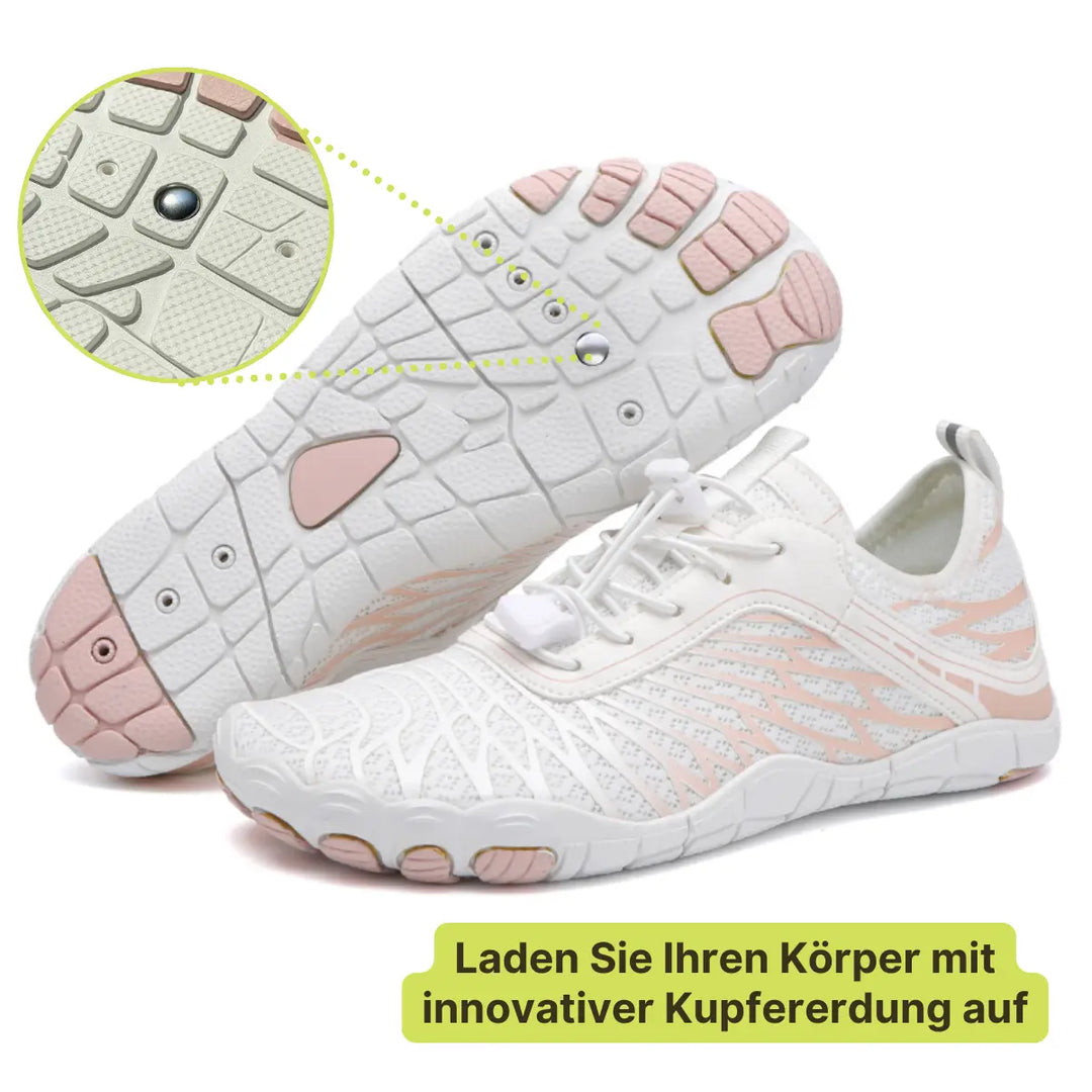 Weißer Barfußschuh mit Kupferpunkt in der Sohle im Detail