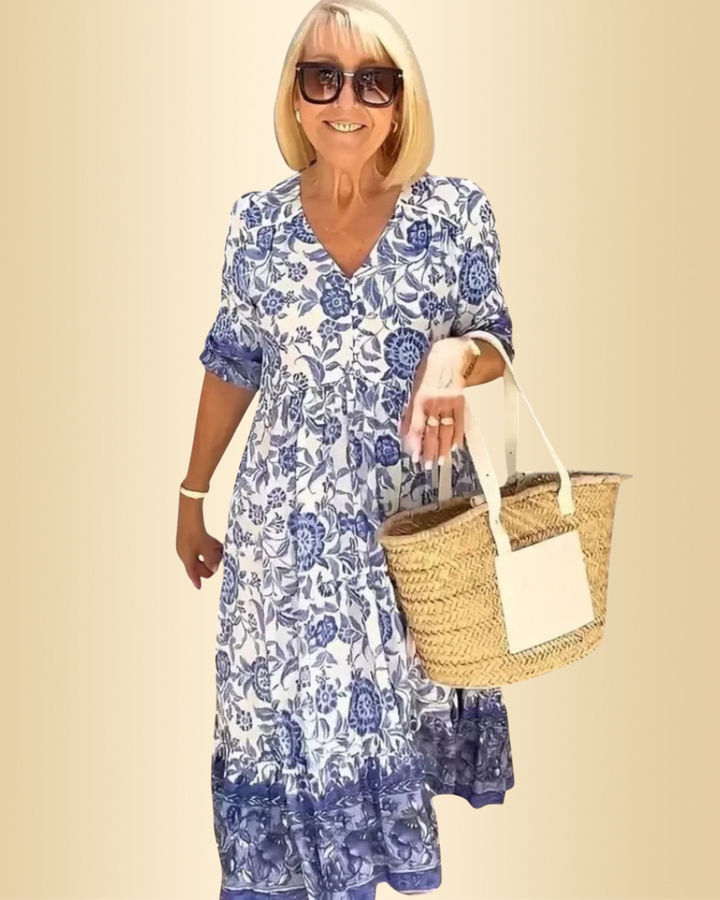Damen Sommerkleid in Blau mit Print kombiniert mit Handtasche