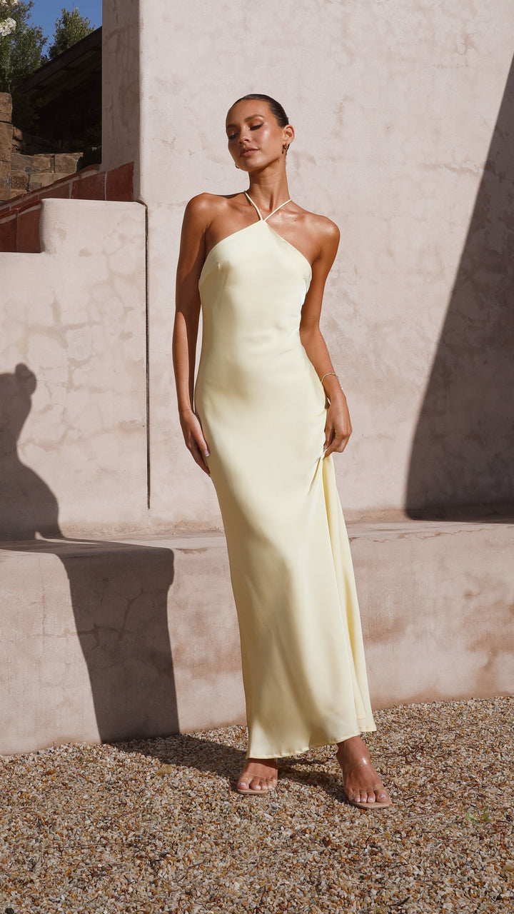 Damen Halterneck Maxikleid in Gelb, rückenfrei. Ein elegantes und modernes Hochzeitsgastkleid.