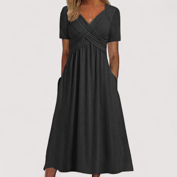 Schwarzes Damen Midikleid mit V-Ausschnitt und praktischen Taschen